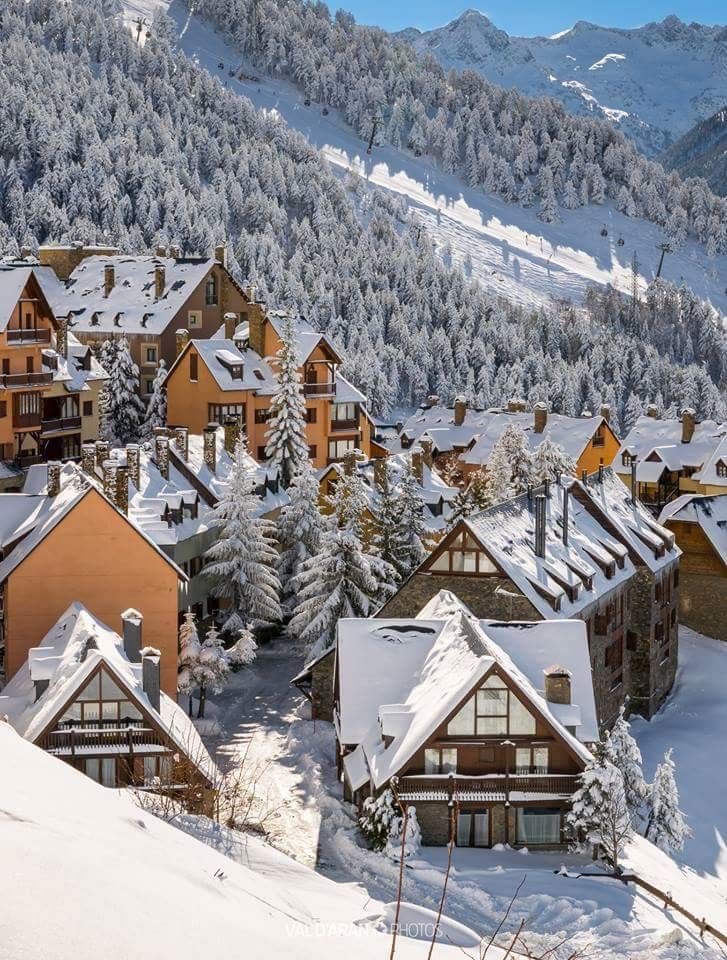 Snow-covered chalets in the Val d'Aran